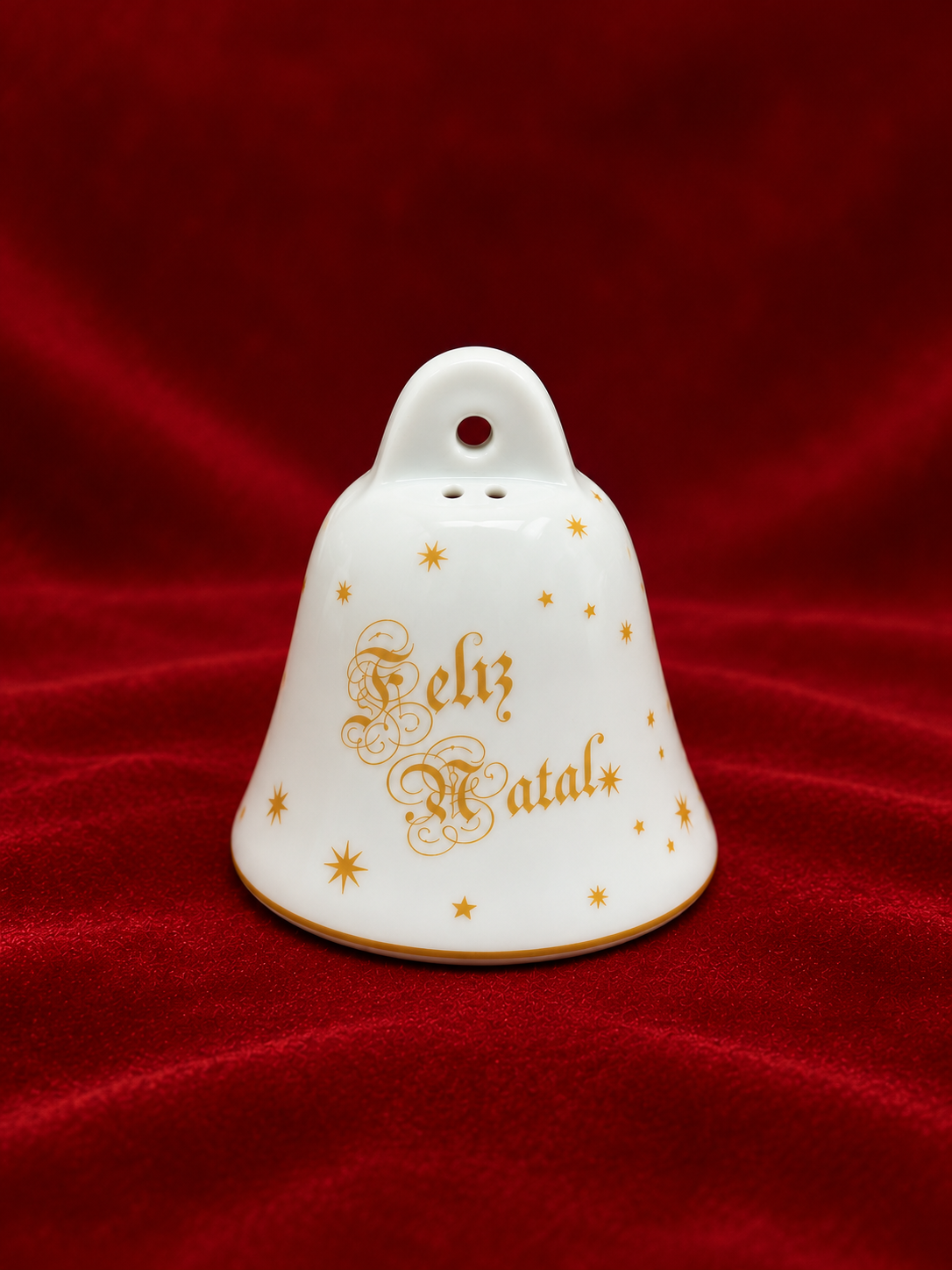 Sino de Natal dourado em porcelana